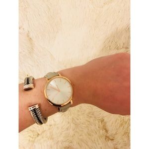Gray leather watch w/ gold rim face